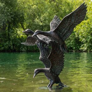 Three Flying Ducks
