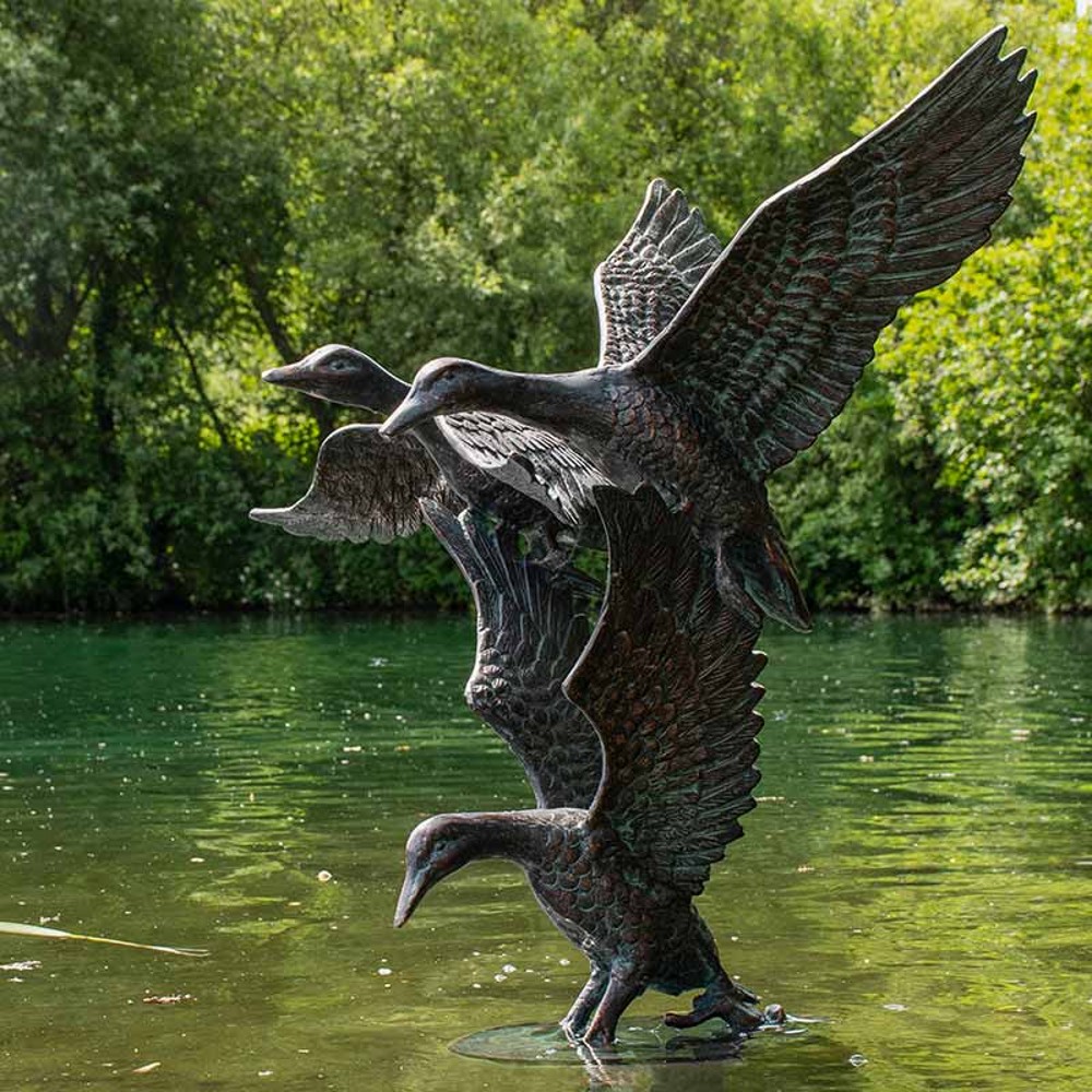 Three Flying Ducks
